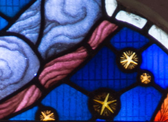 Detail of a stained glass window in Lampeter of stars
