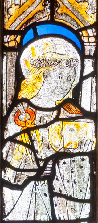 Detail of a medieval stained glass window.