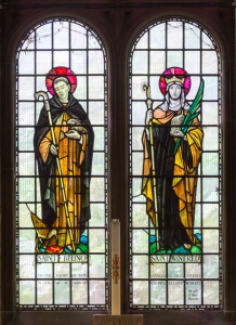 stained glass window of St Beuno and St Gwenfrewy..
